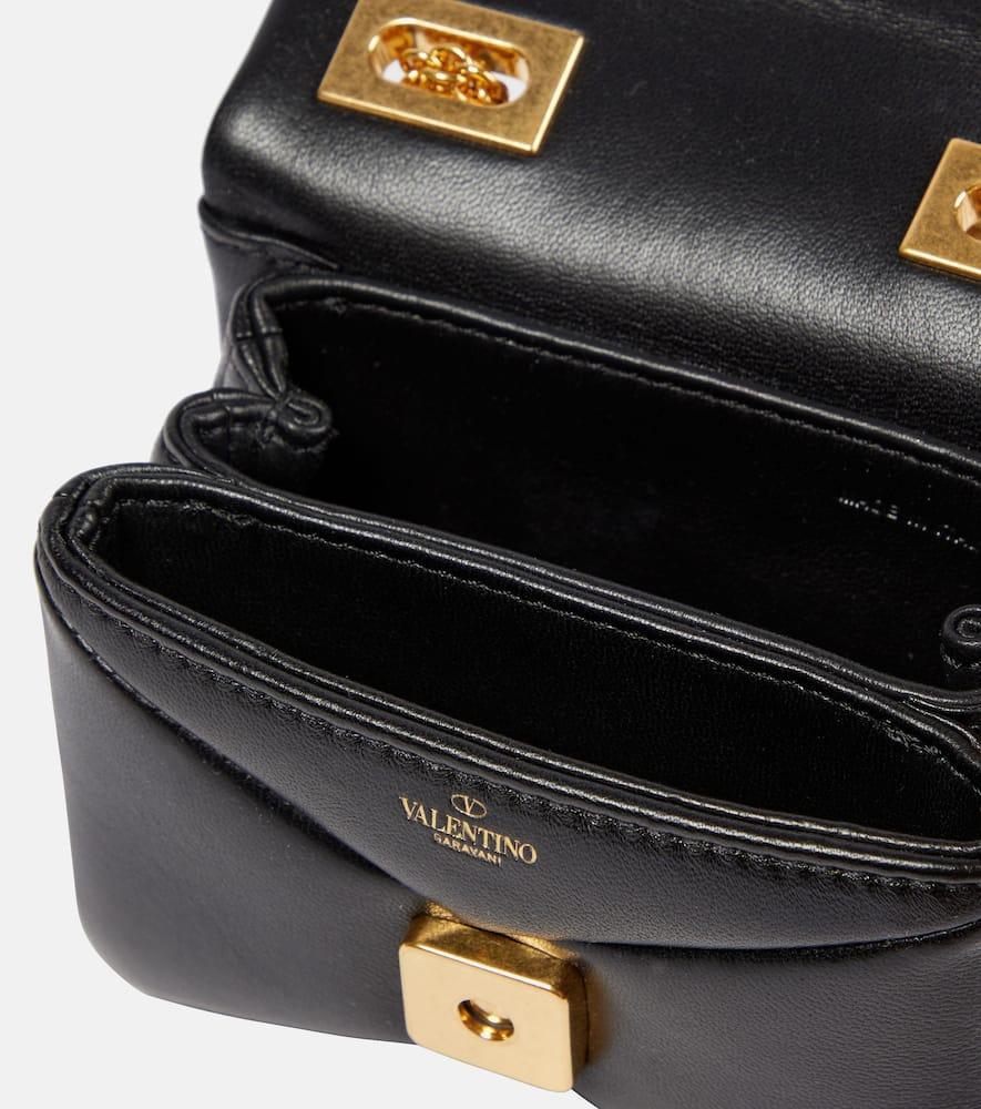 VALENTINO GARAVANI One Stud Micro Leather Crossbody Bag In Gold Product Image