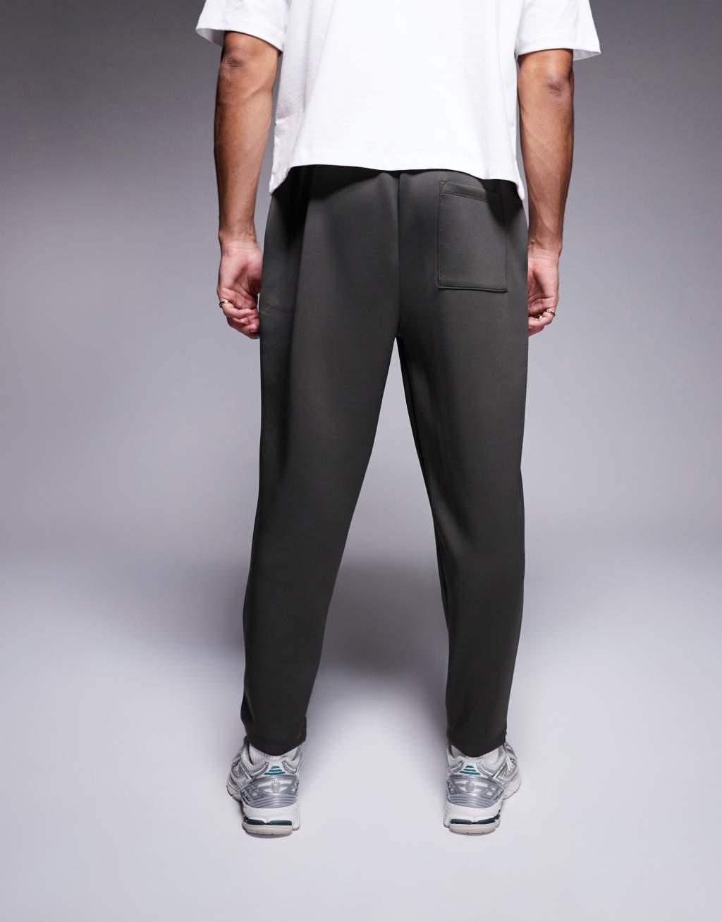 ASOS DESIGN tapered scuba sweatpants in khaki Product Image