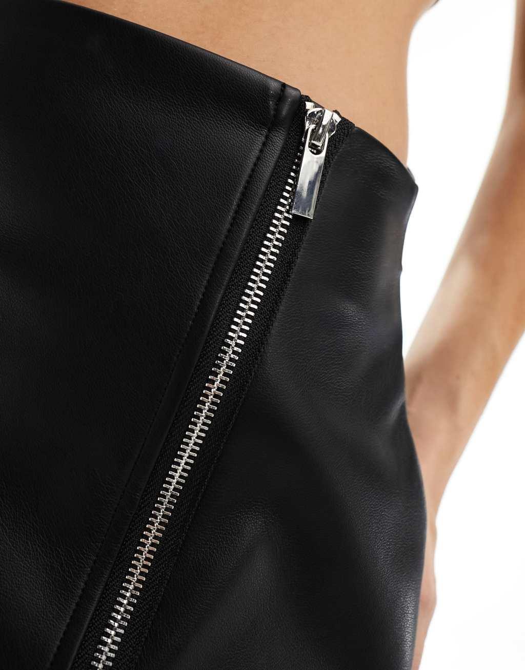 Simmi wrap zip detail asymmetric hem mini skirt in black Product Image