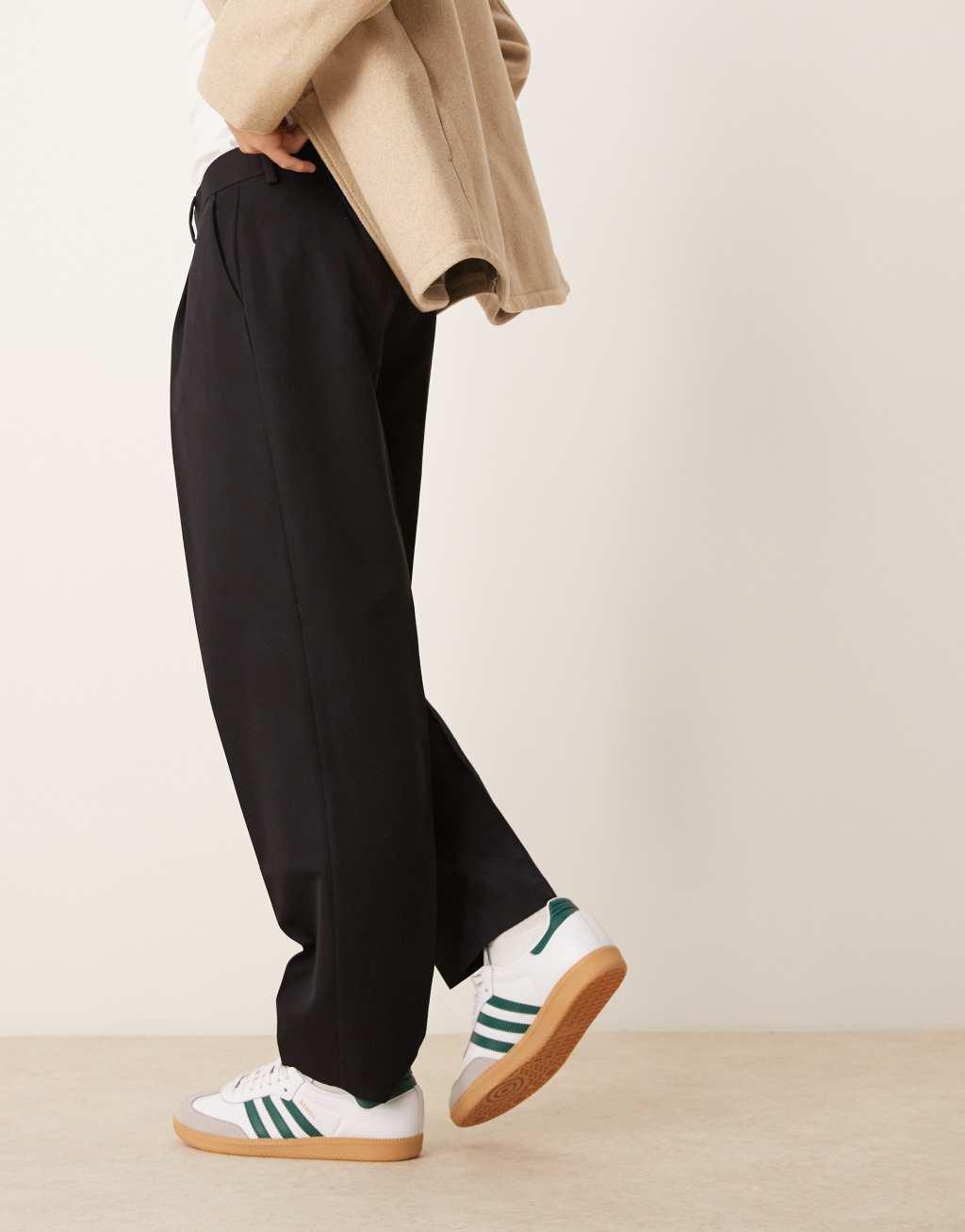 ASOS DESIGN smart oversized tapered pants with front pleat in black Product Image