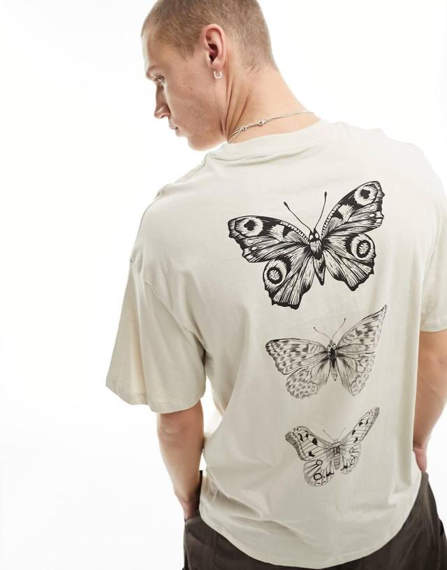 Jack & Jones oversized T-shirt with butterfly back print in beige Product Image