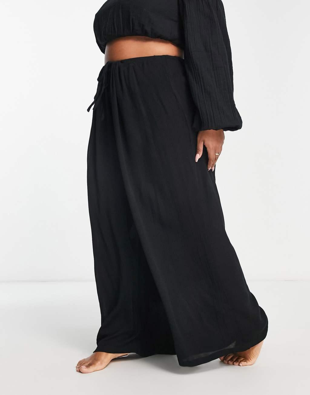 ASOS DESIGN Curve drawstring palazzo beach pants in black Product Image