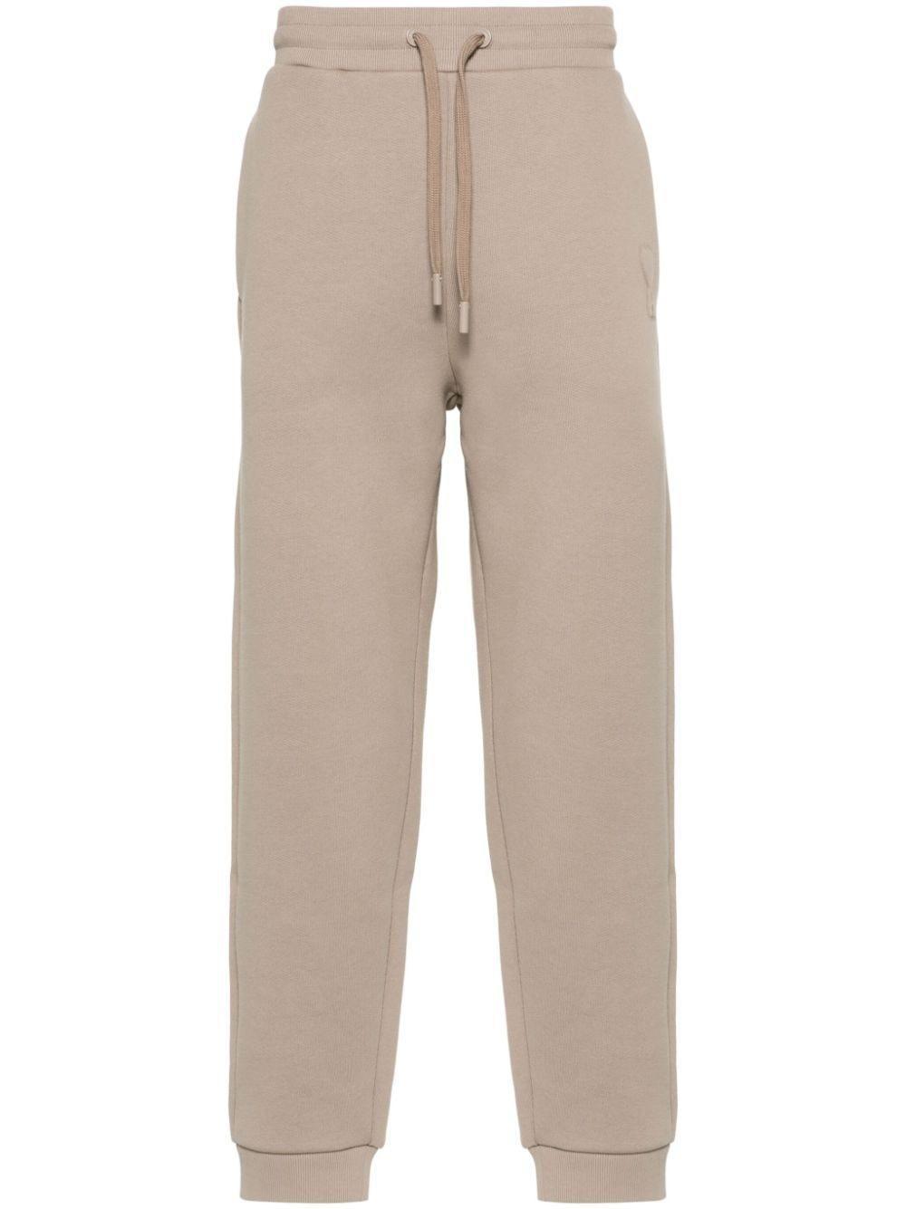 Embossed-logo Track Pants In Neutrals Product Image