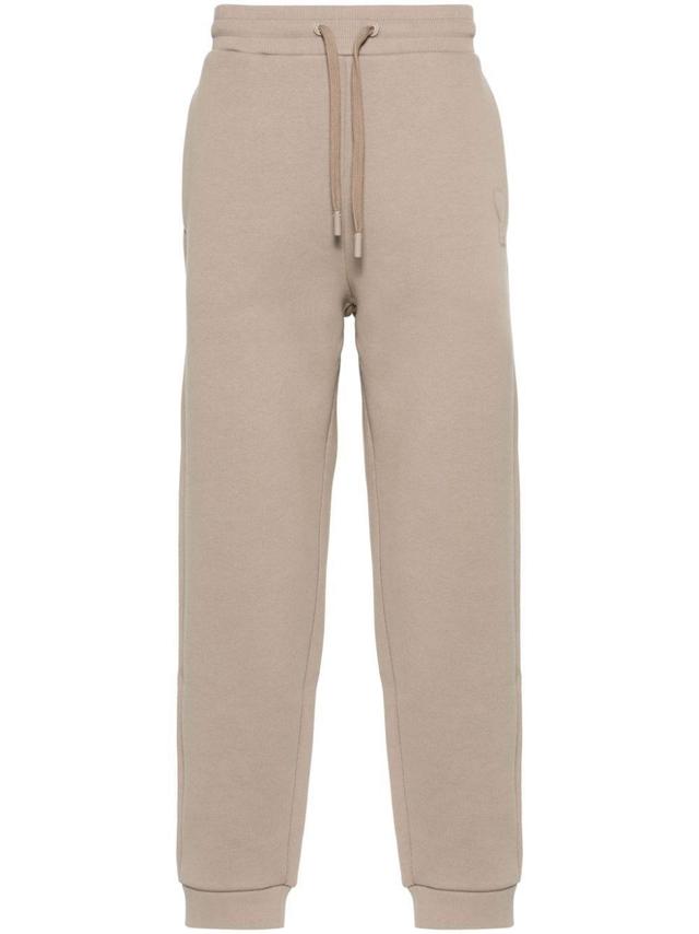 Embossed-logo Track Pants In Neutrals Product Image