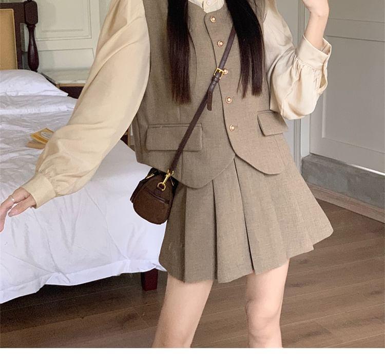 Long Sleeve Stand Collar Plain Frill Blouse / V-Neck Plain Button Vest / High Waist Pleated Mini A-Line Skirt Product Image