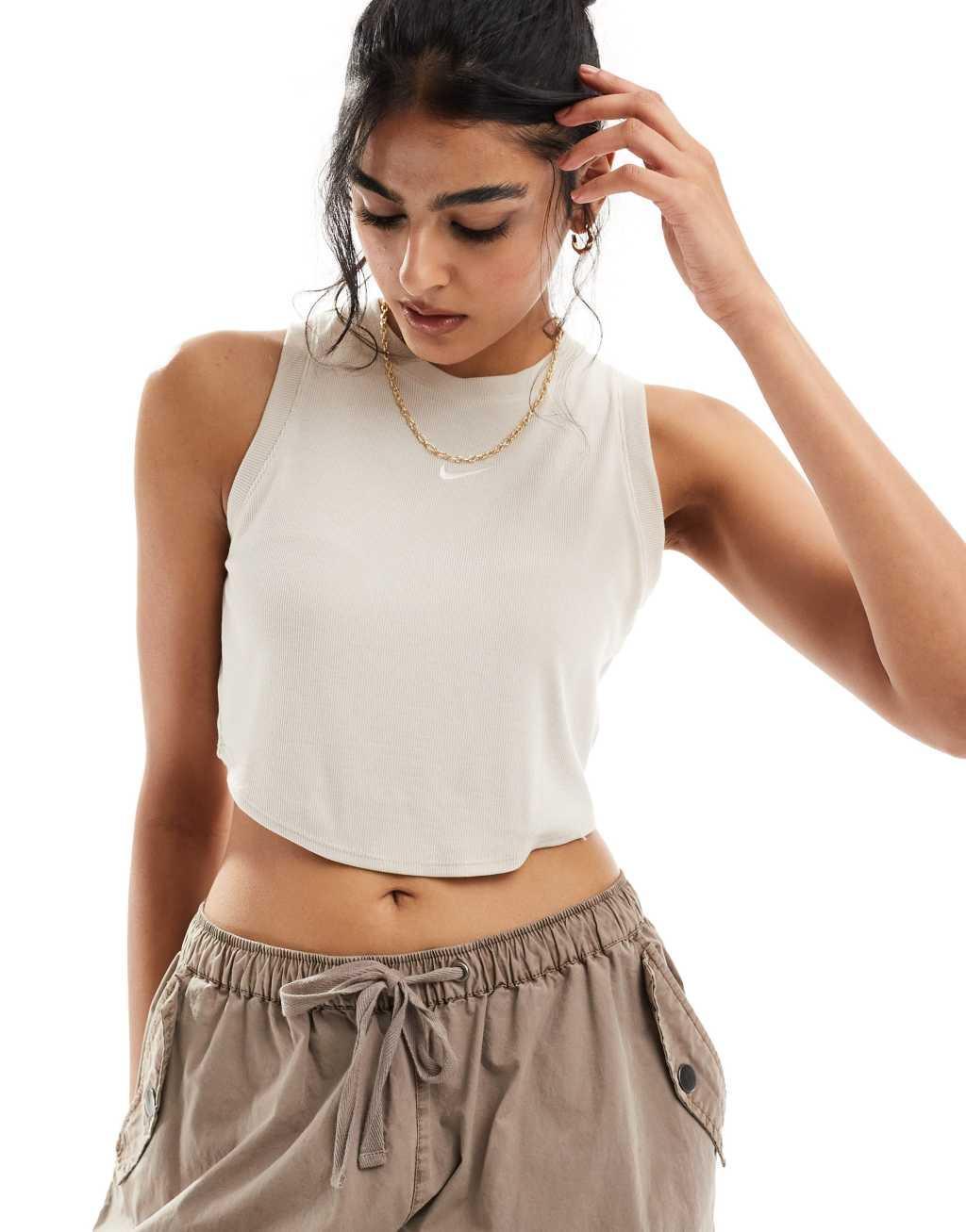 Nike Essential ribbed cropped tank top in beige Product Image