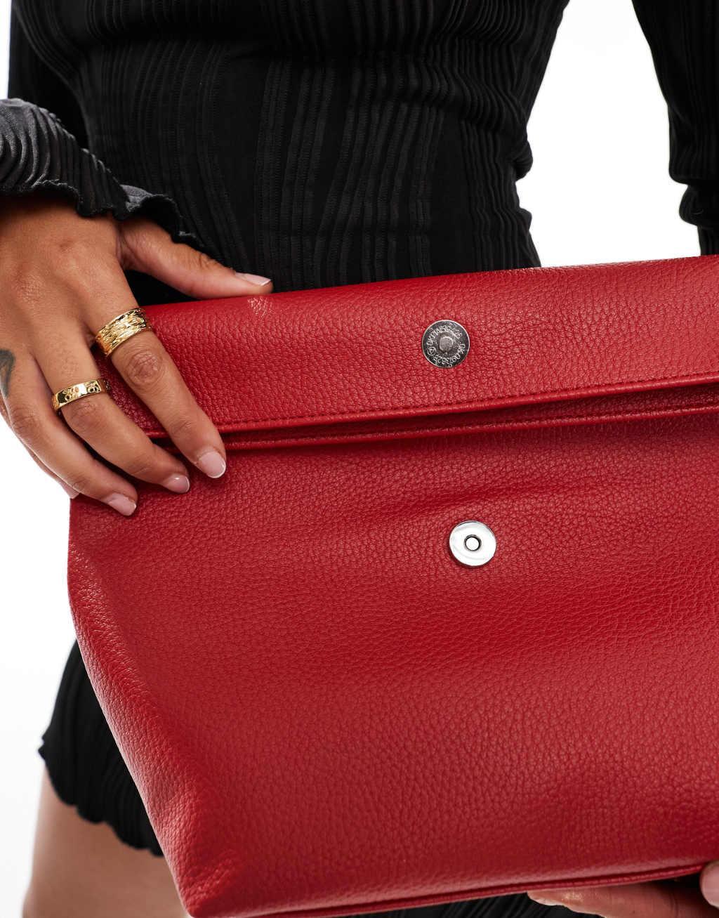 ASOS DESIGN roll top clutch bag in red Product Image