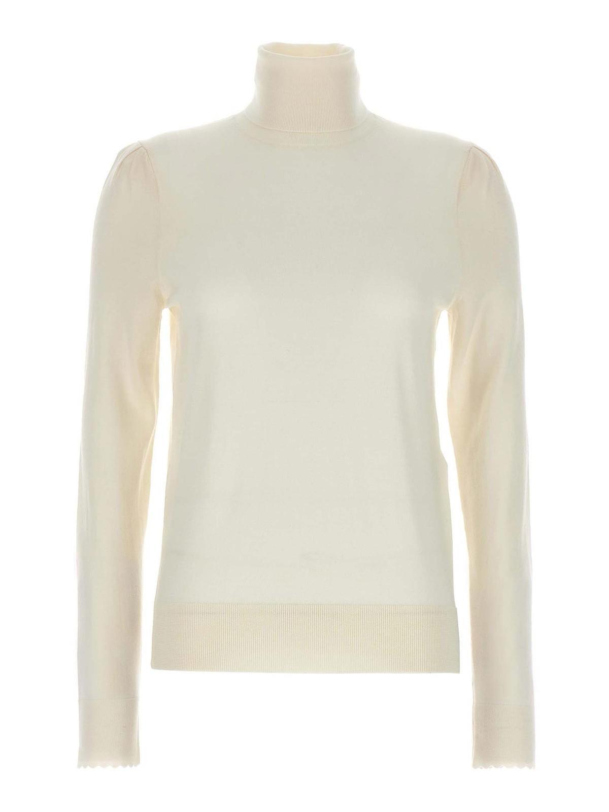 Wool Turtleneck Sweater In Cream Product Image