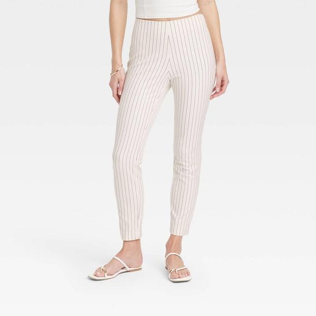 Womens Bi-Stretch Skinny Pants - A New Day Cream/Black Pinstripe 12 Product Image