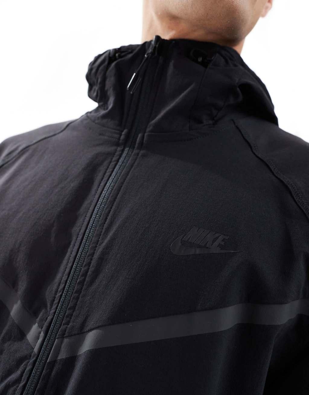 Nike Tech Woven full zip hoodie in black Product Image