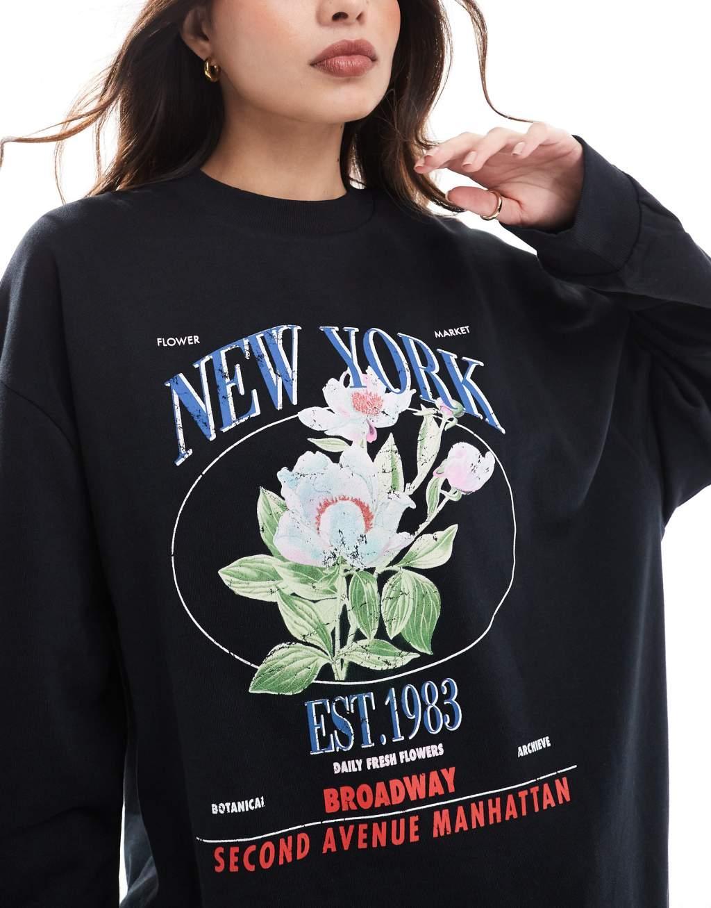 ASOS DESIGN oversized sweatshirt in New York floral print in black Product Image