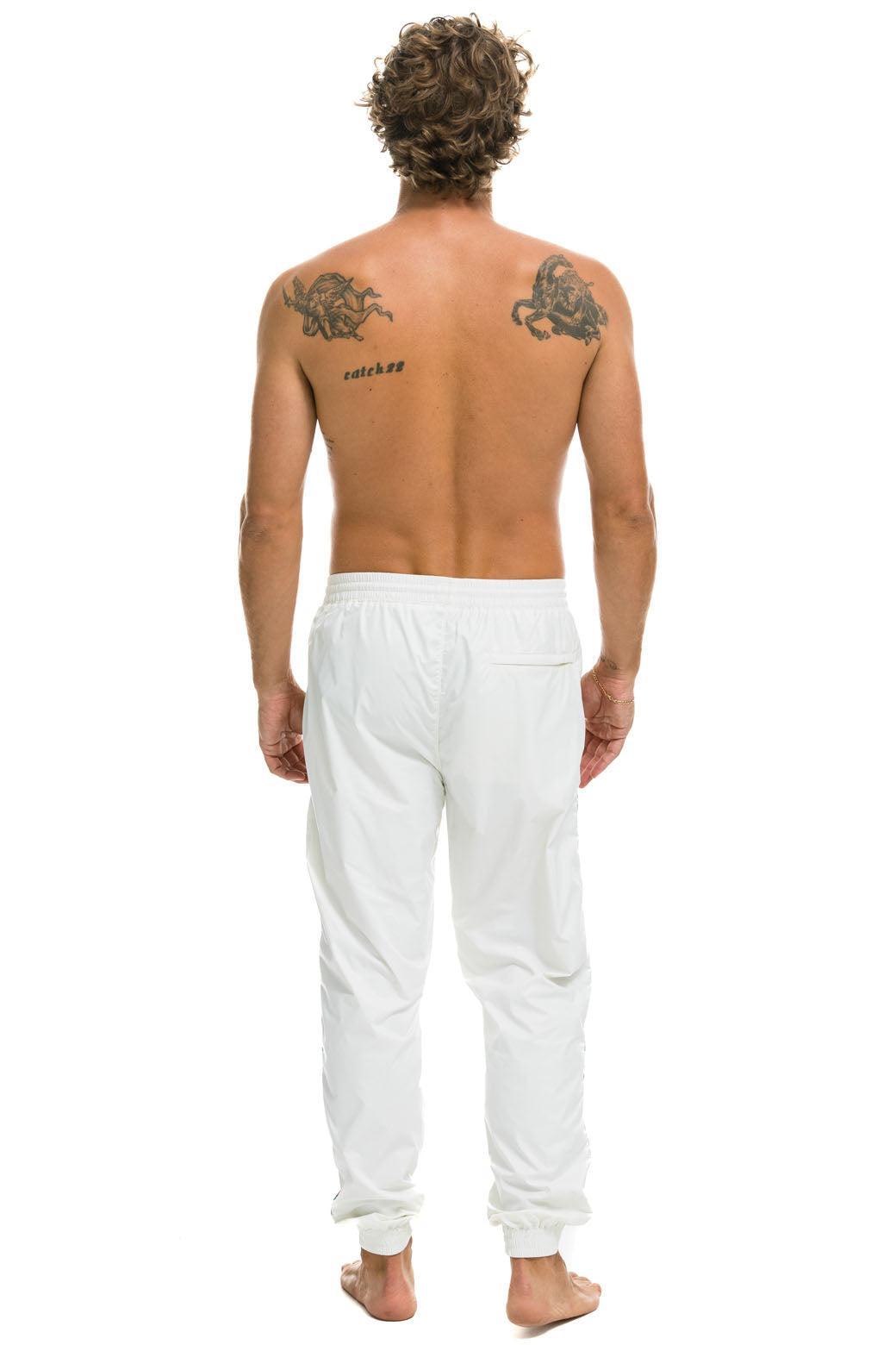 MEN'S 4 STRIPE WIND PANT - WHITE Male Product Image