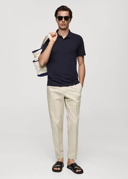 Slim-fit cotton piqué textured polo shirt - Men | MANGO USA Product Image