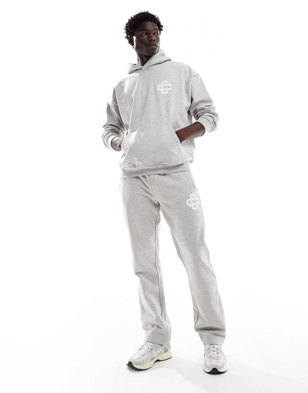 The Couture Club heavyweight emblem sweatpants in gray - part of a set Product Image