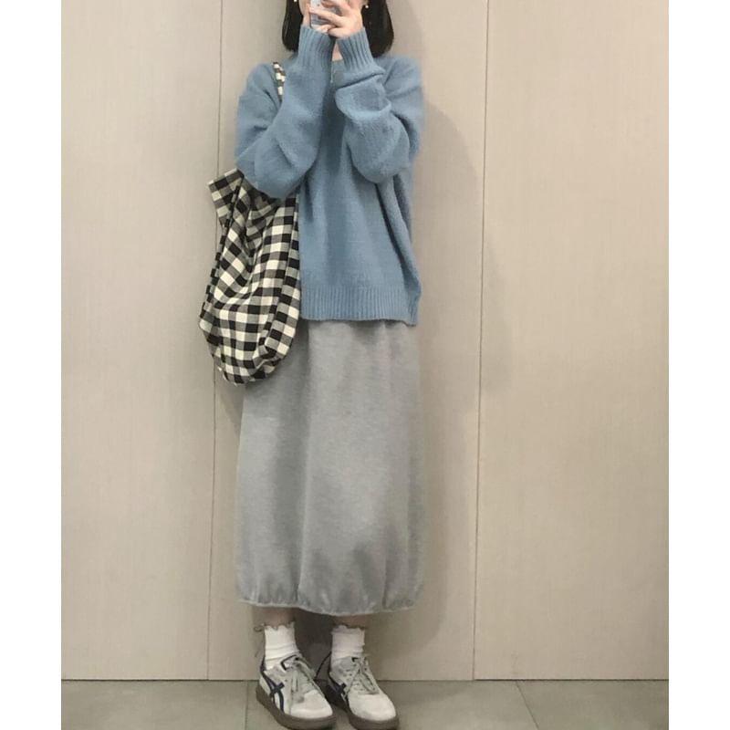 Set: Long-Sleeve Round Neck Plain Sweater + High Rise Midi A-Line Skirt Product Image