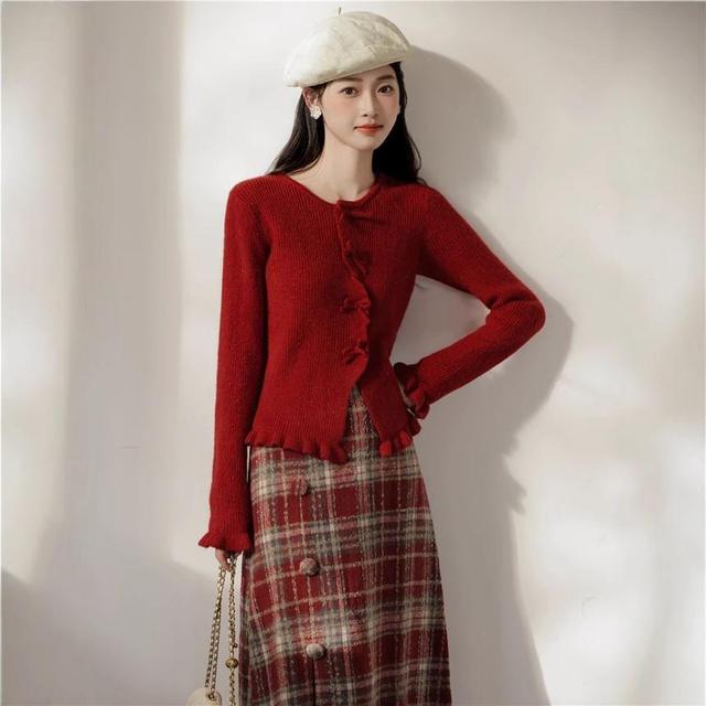 Set: Long-Sleeve Crew Neck Plain Bow Button Knit Top + High Waist Plaid Slit Midi A-Line Skirt Product Image