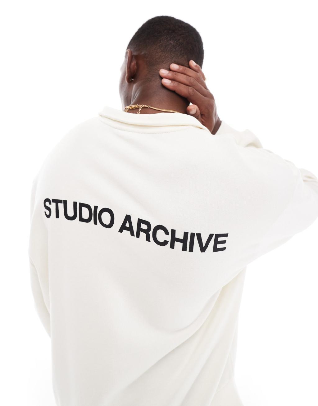 ASOS DESIGN boxy oversized 1/2 zip with studio archive back print in ecru product image