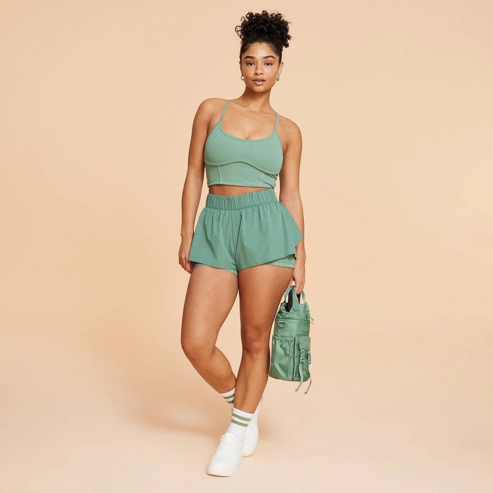 Blogilates Women's Ruffle Woven Mid-Rise Shorts 3" - Olive Green XS Product Image