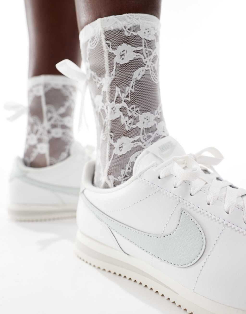 Nike Cortez leather sneakers in white and silver   Product Image