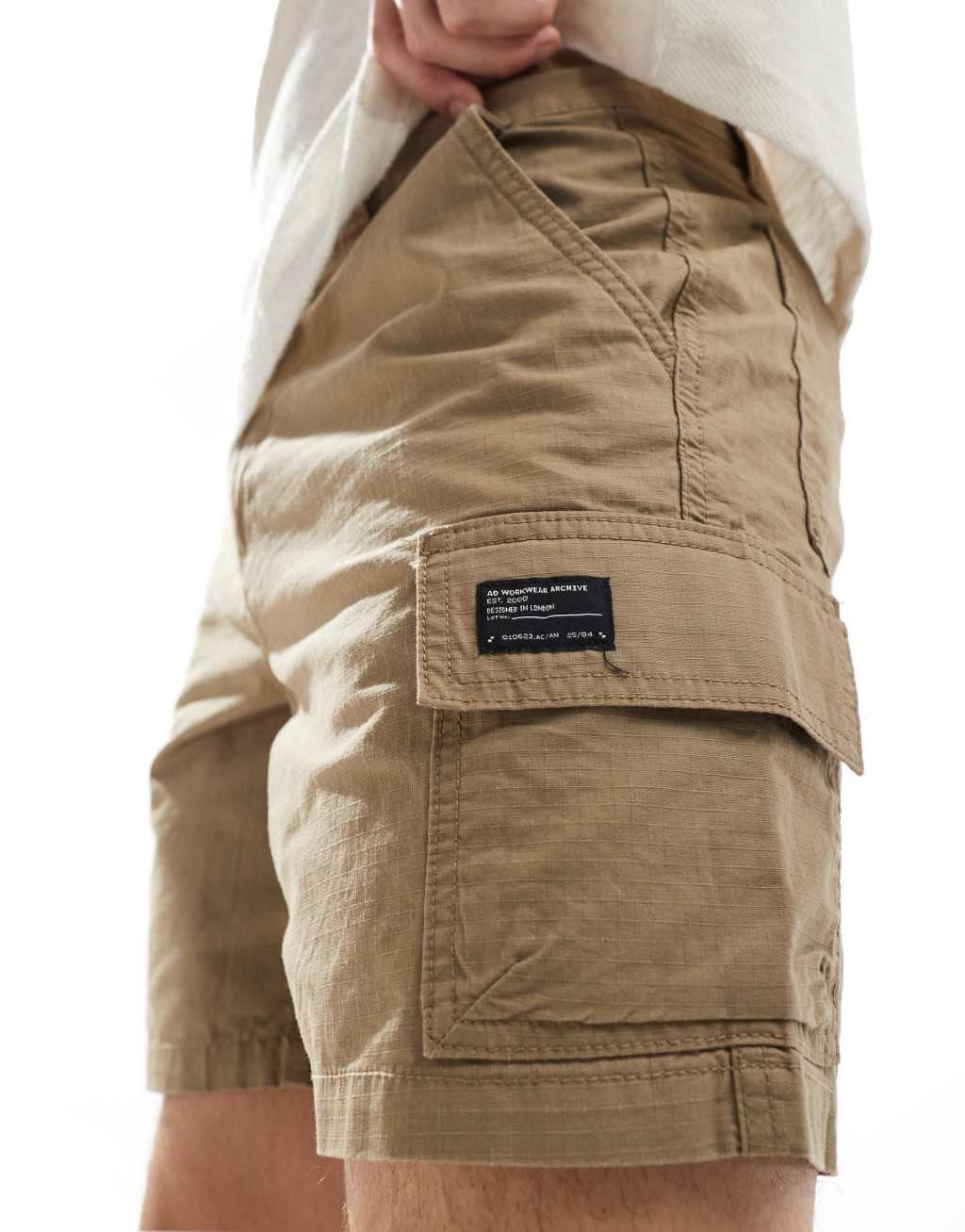 ASOS DESIGN slim cargo shorts with patch in khaki Product Image