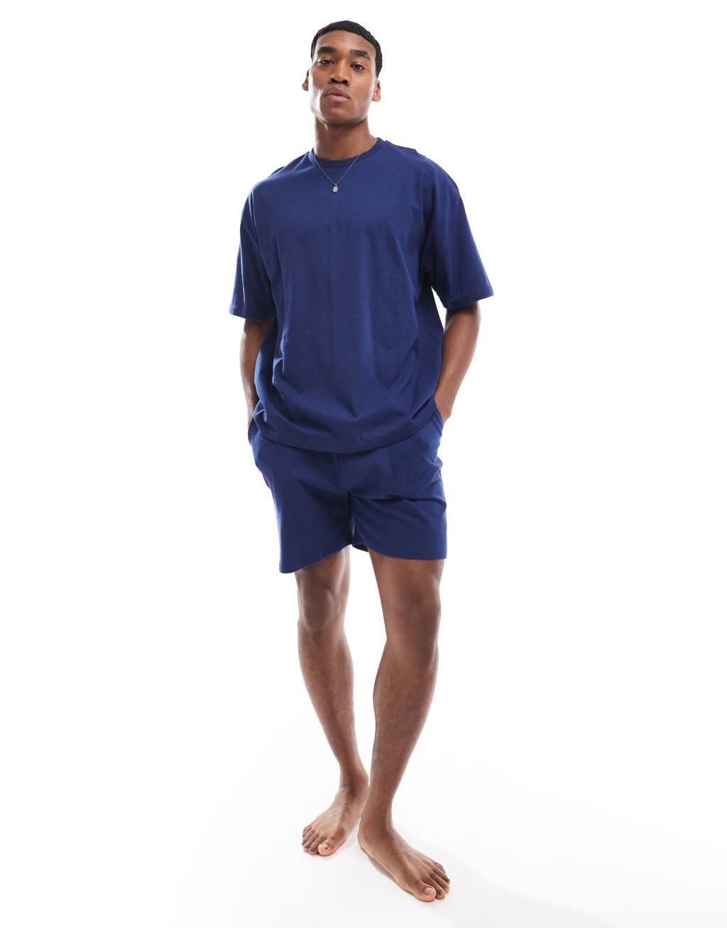 ASOS DESIGN pajama set with Dreamer graphics in navy Product Image