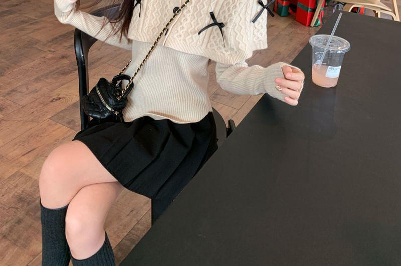 Long Sleeve Plain Ribbed Top / Stand Collar Bow Cable Knit Button Capelet Product Image