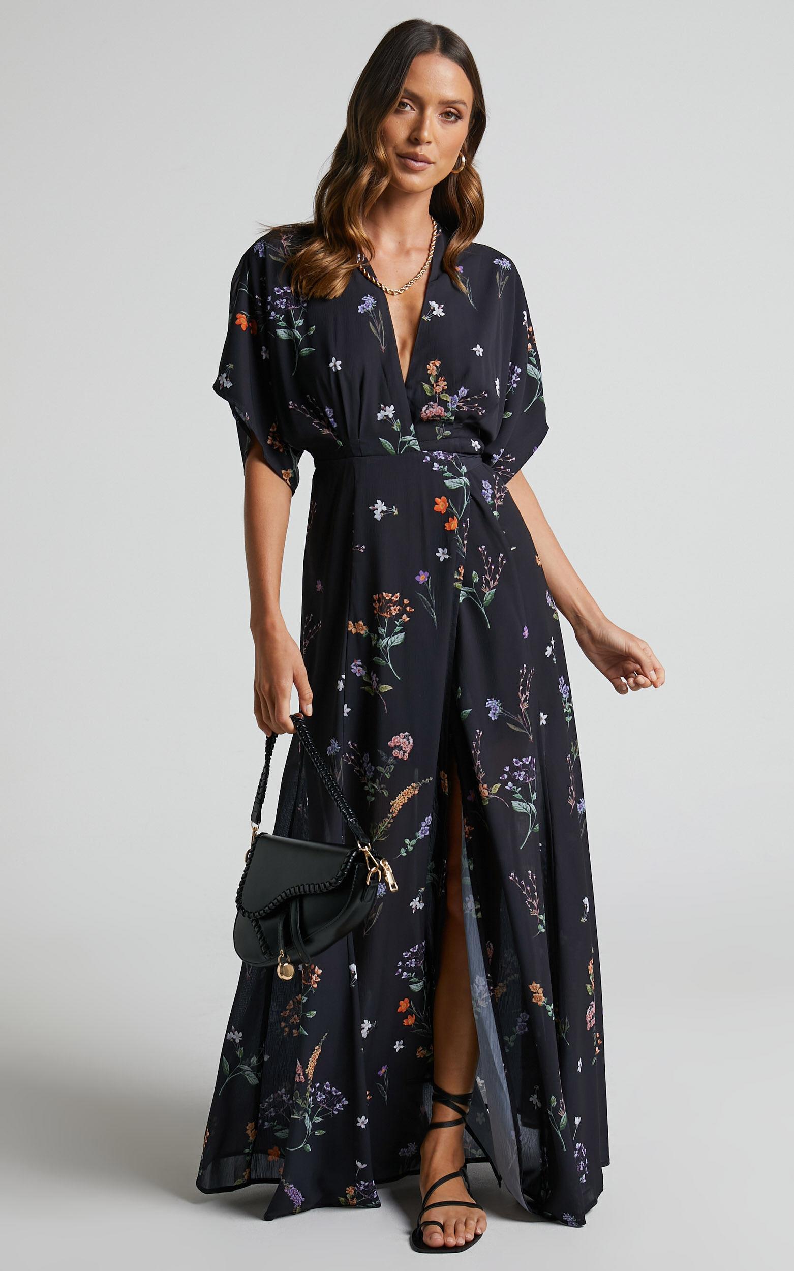 Erenza Maxi Dress - Extended Sleeve Wrap Dress in Black Flower Field Product Image