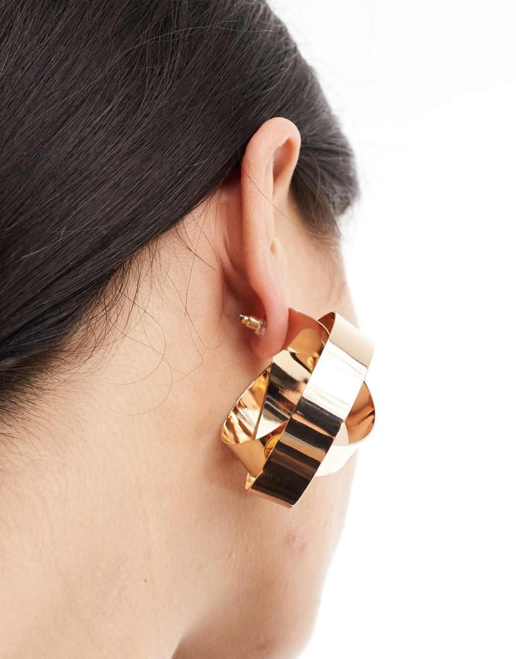 ASOS DESIGN oversized stud earrings with circle knot detail in gold tone Product Image