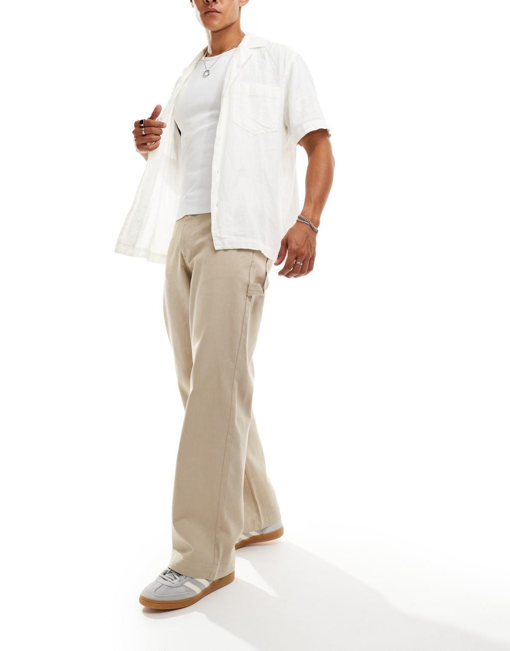 ADPT wide fit carpenter twill pants in beige  Product Image