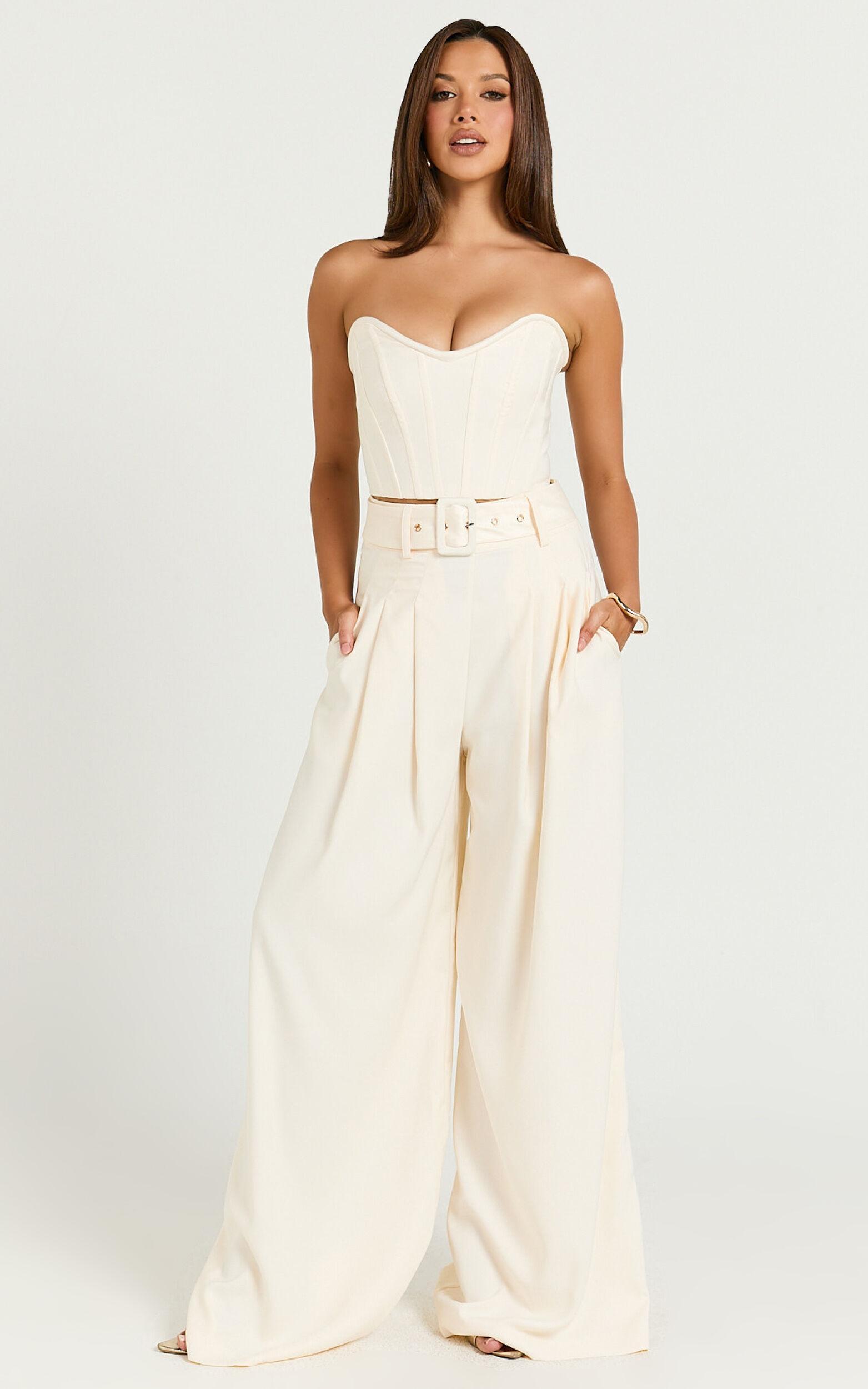 Amalie The Label - Raquelle Pleated Wid Leg Belted Pant in Ivory Product Image