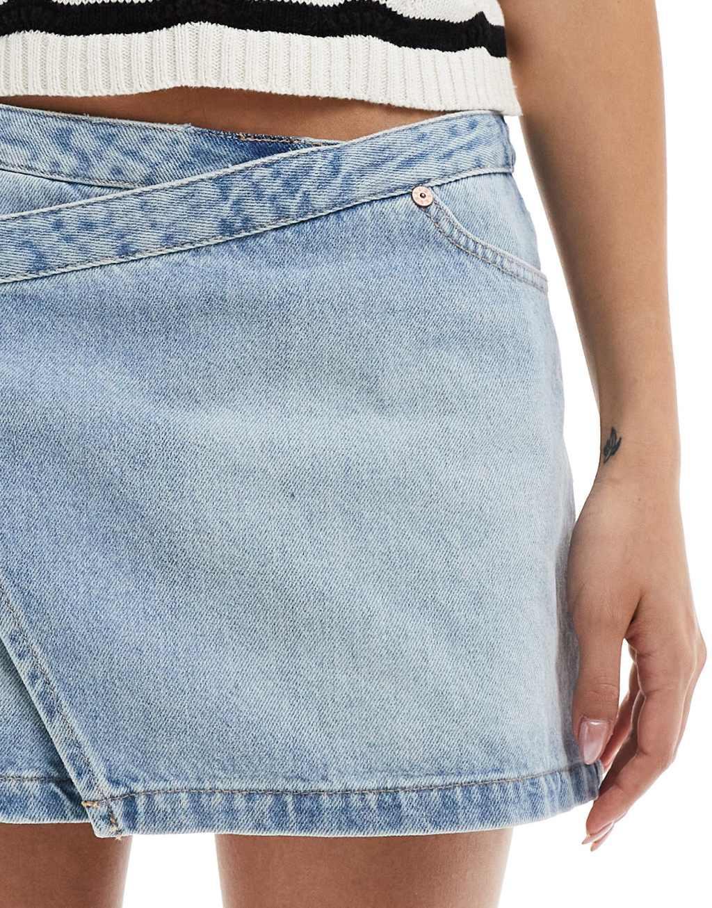 Bershka wrap front denim mini skirt in light blue Product Image