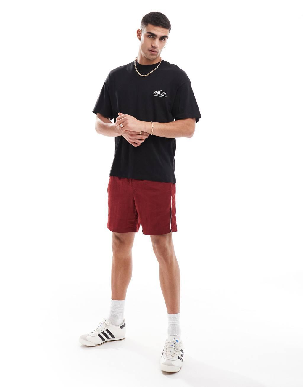 Jack & Jones oversized T-shirt with Le Soleil art back print in black Product Image