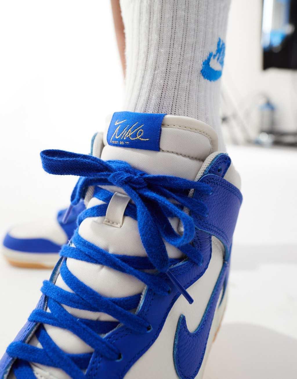 Nike Dunk High SE sneakers in white and blue Product Image