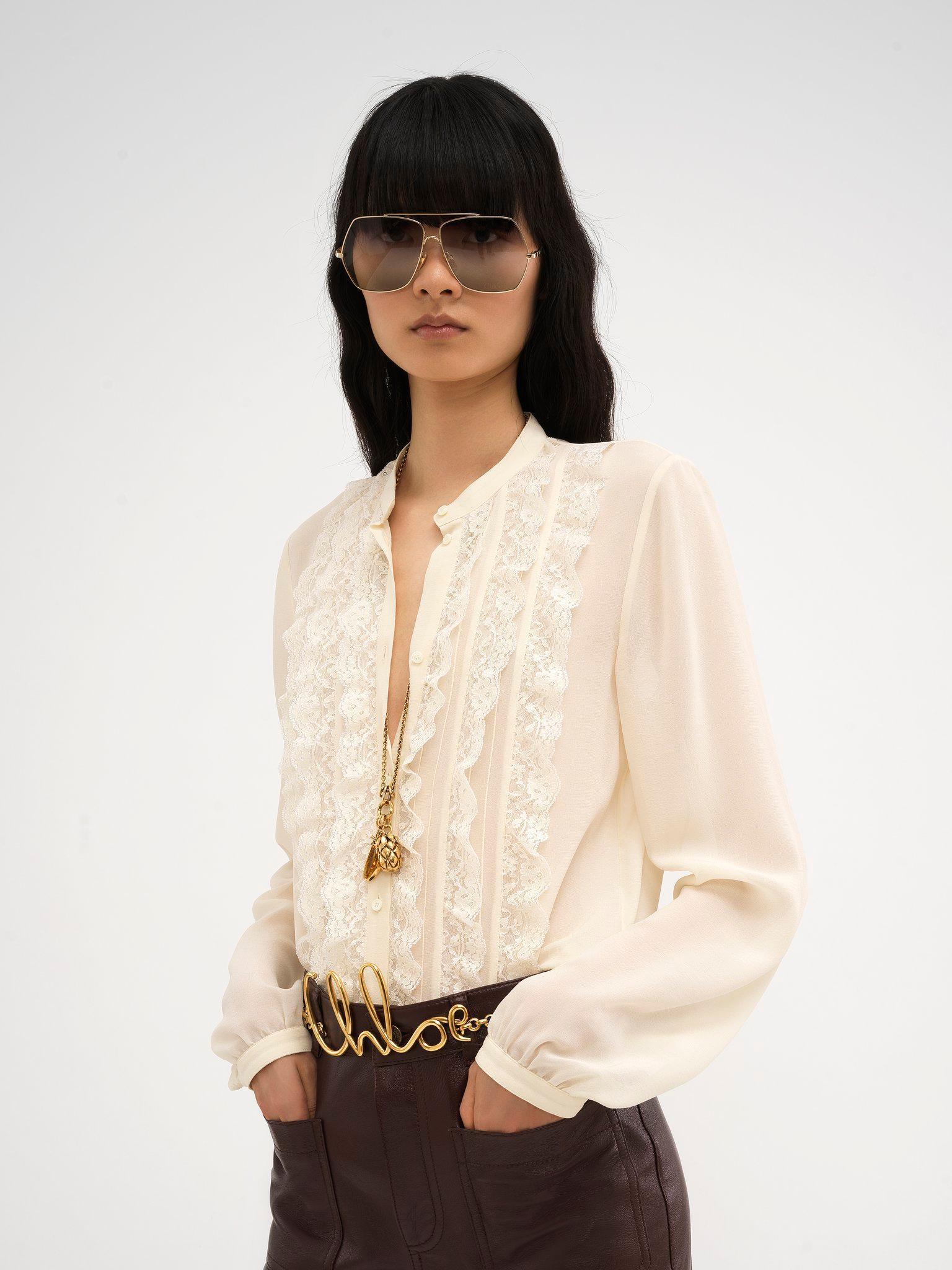 Collarless ruffled blouse in silk georgette Product Image