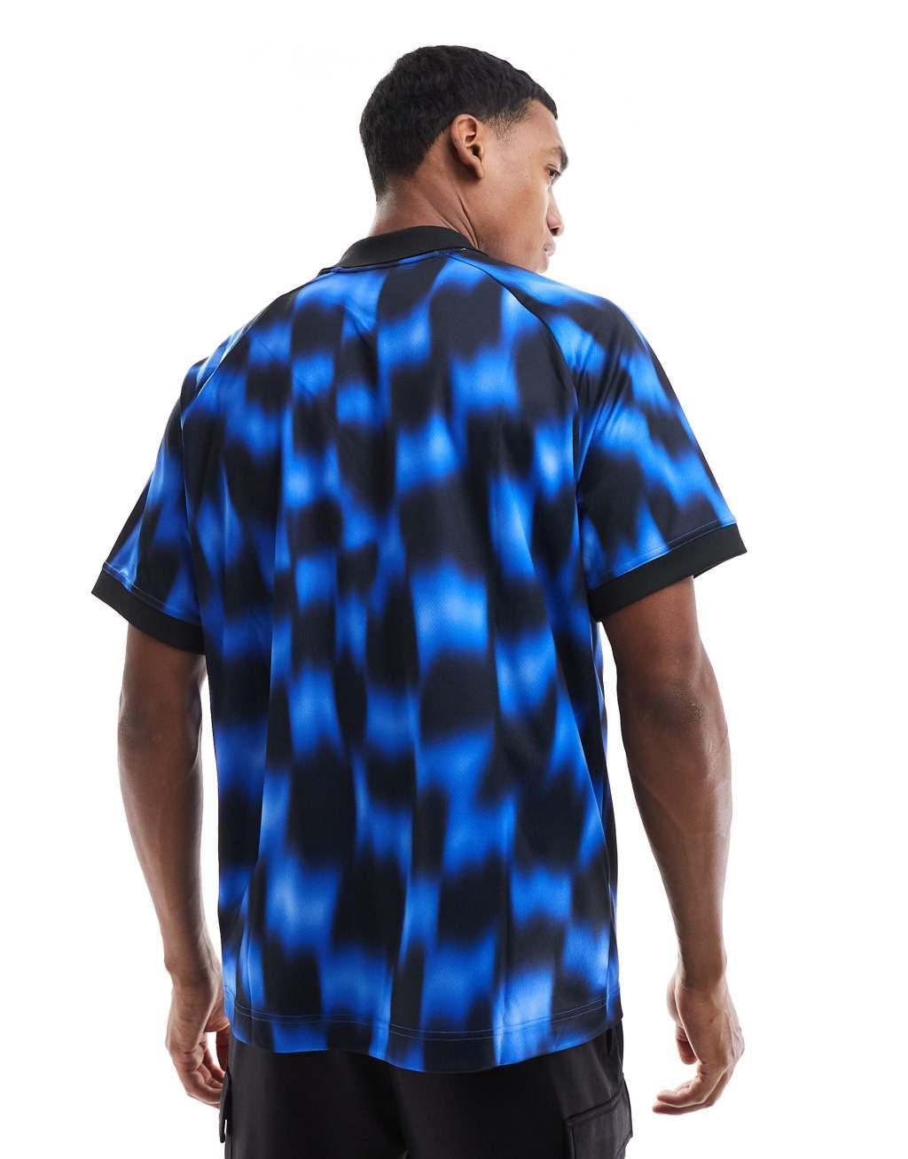 Nike Football Culture of Football printed t-shirt in blue Product Image