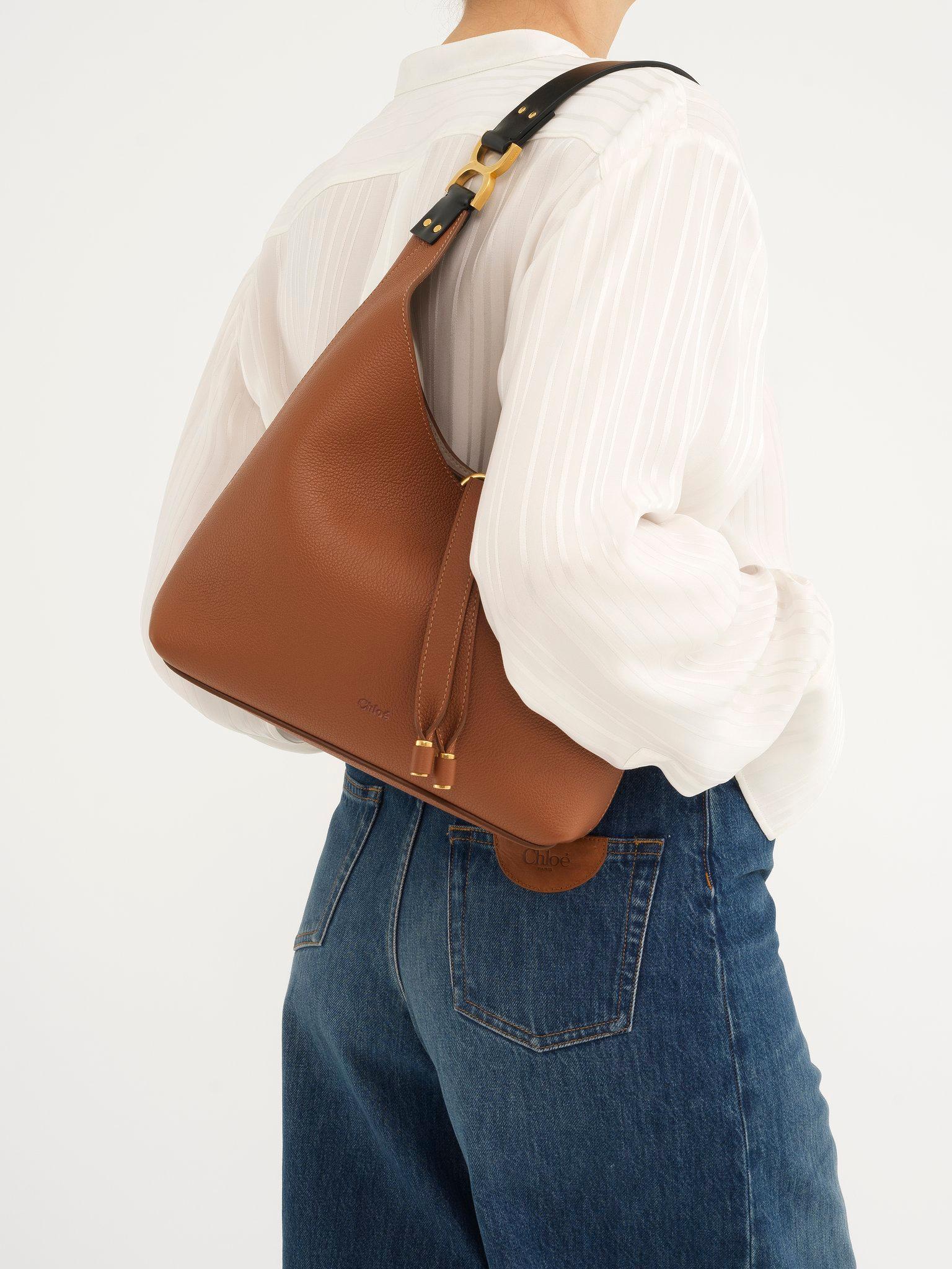 Small Marcie hobo bag in grained leather Product Image