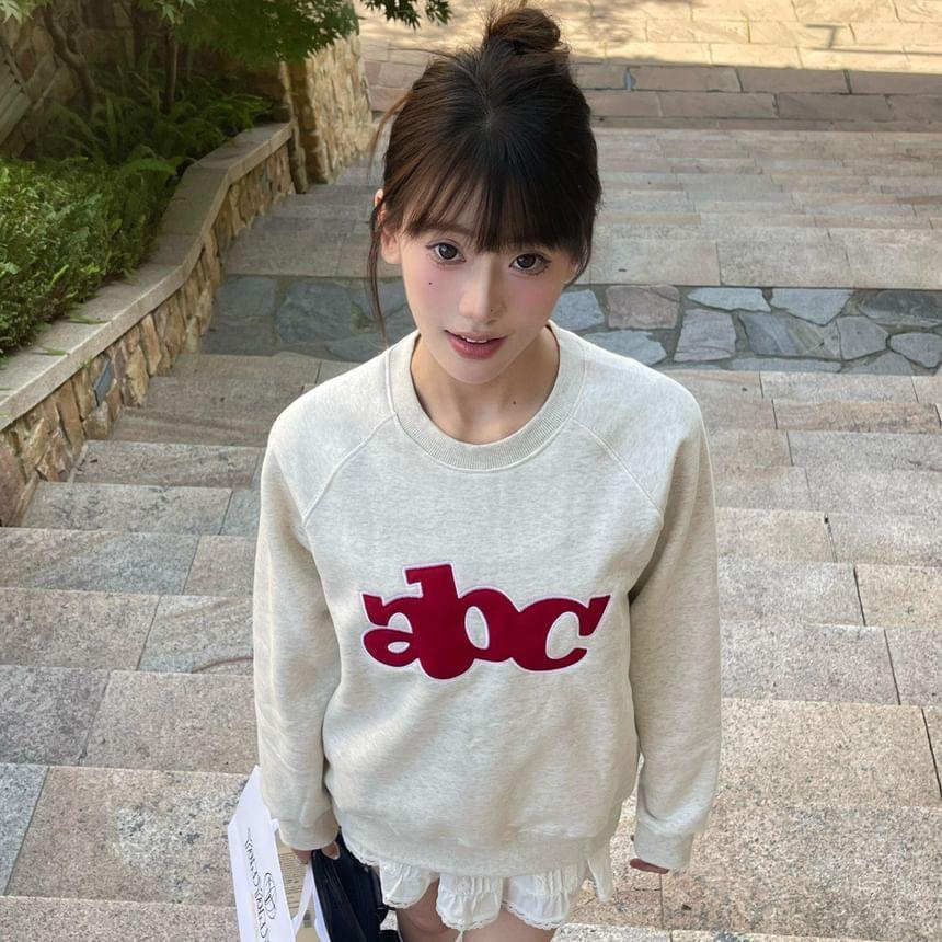 Long Sleeve Lettering Embroidered Loose-Fit Pullover Product Image