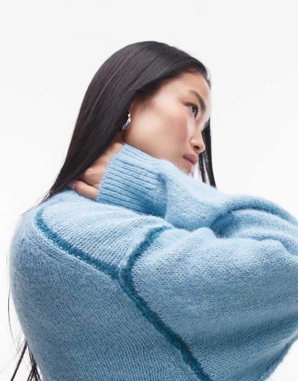 Topshop knitted exposed contrast seam oversized sweater in blue Product Image