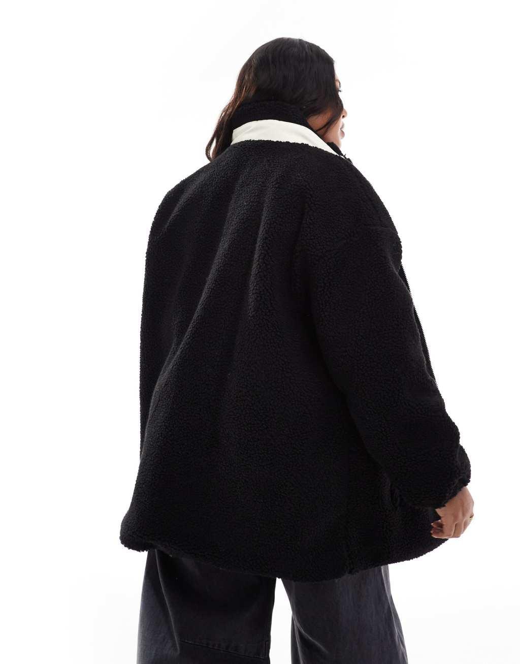 ONLY Curve oversized funnel neck teddy fleece jacket in black Product Image