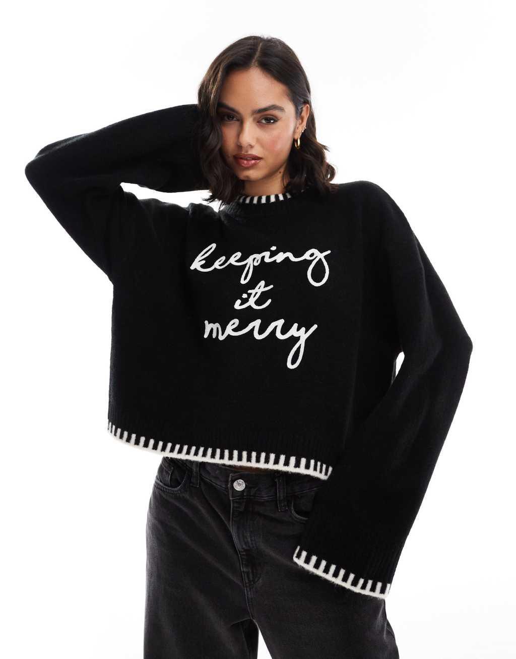 ASOS DESIGN crew neck sweater with blanket stitch and christmas slogan in black and white Product Image