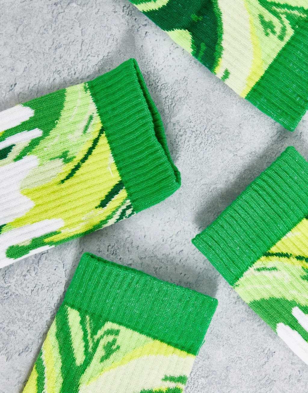 ASOS DESIGN 2 pack sports sock in green with oil affect print Product Image