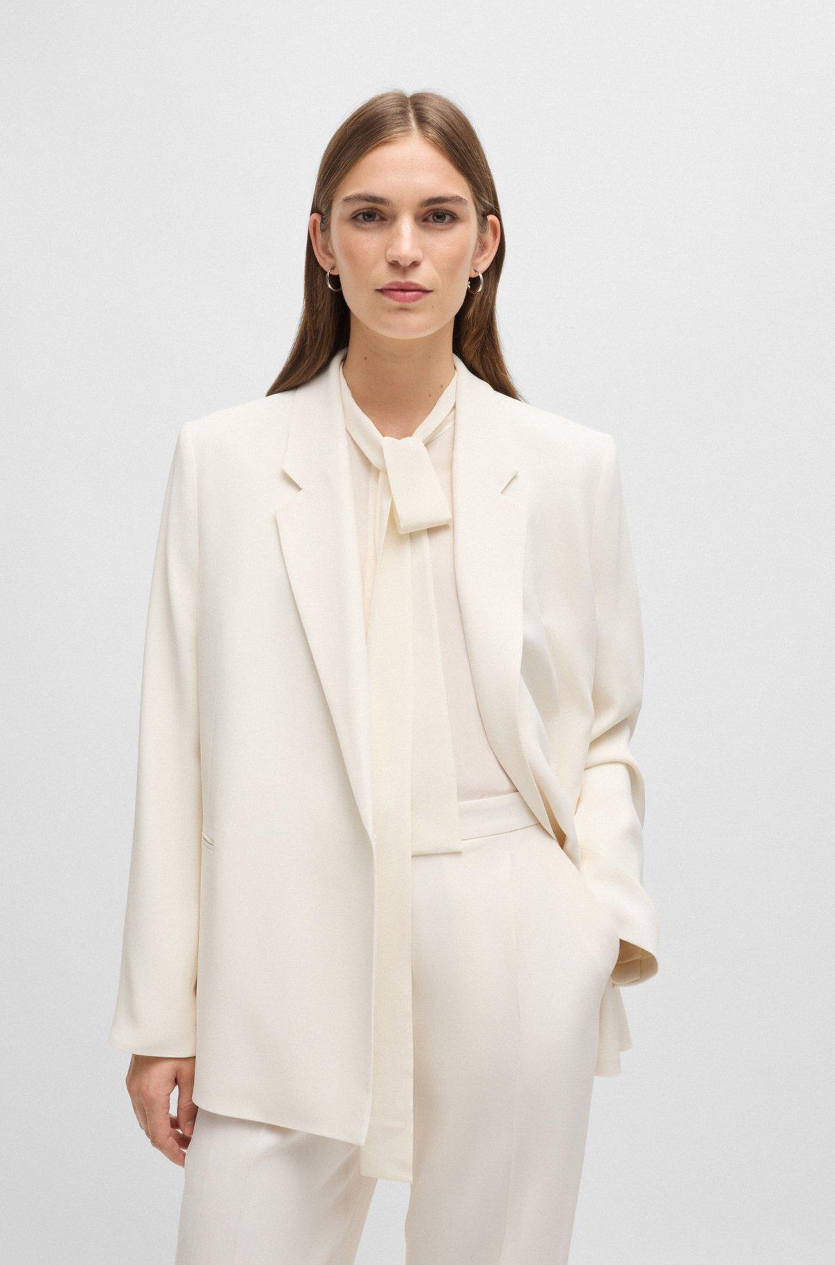 Relaxed-fit jacket with feature button Product Image