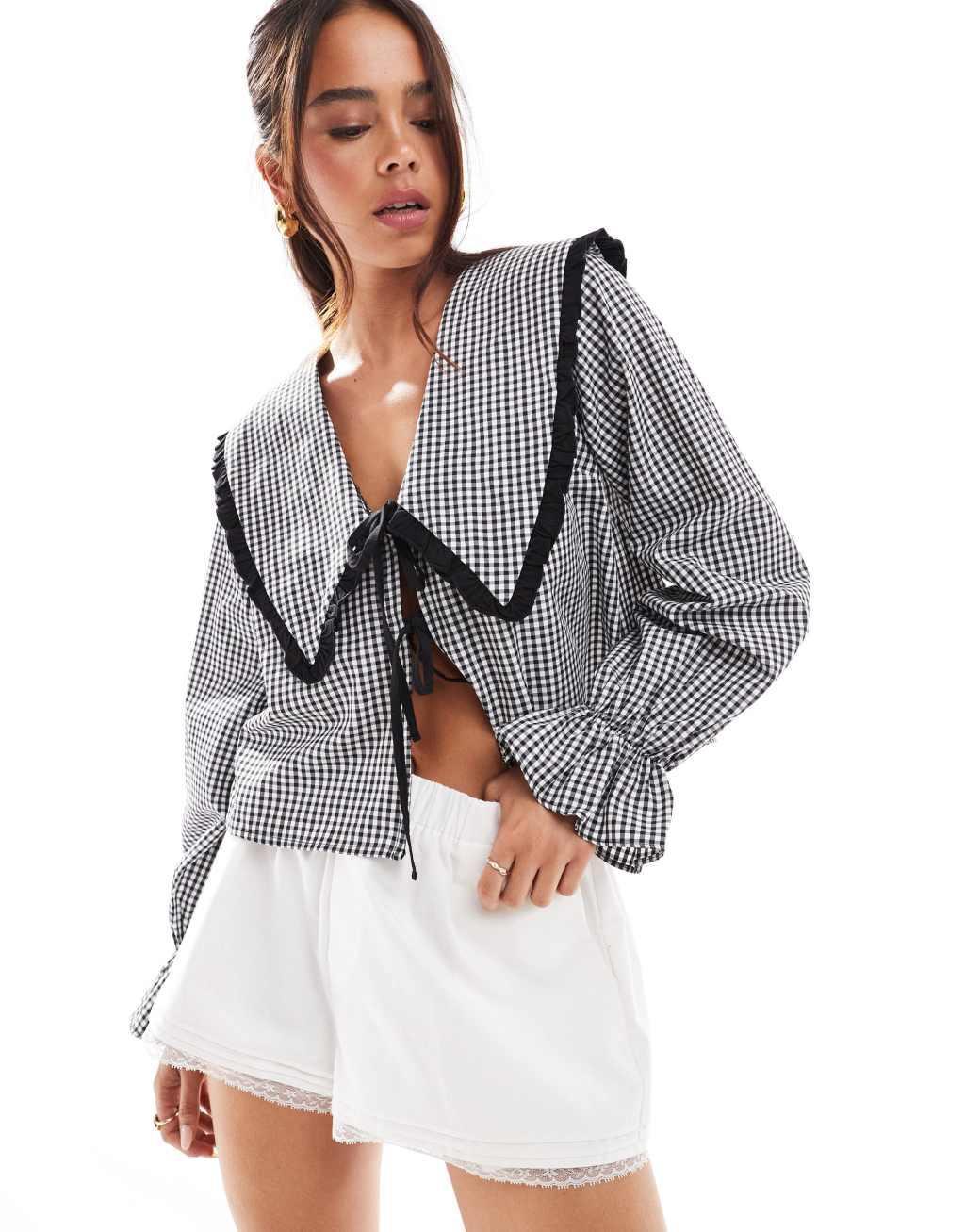 ASOS DESIGN oversized collar tie front blouse in black gingham Product Image