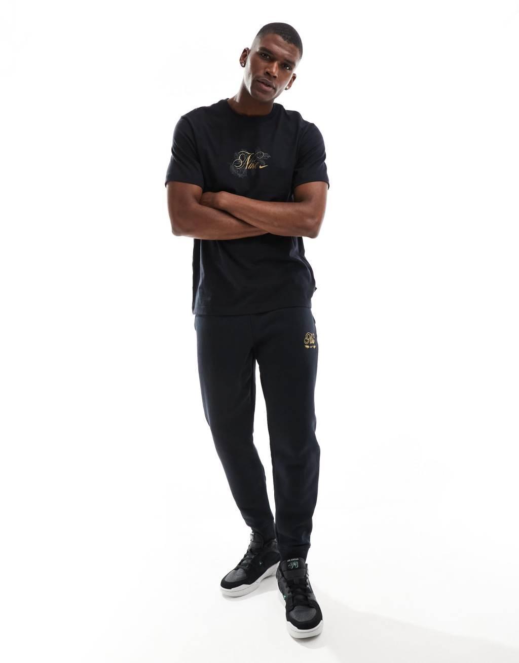 Nike 'Tis The Season logo t-shirt in black Product Image