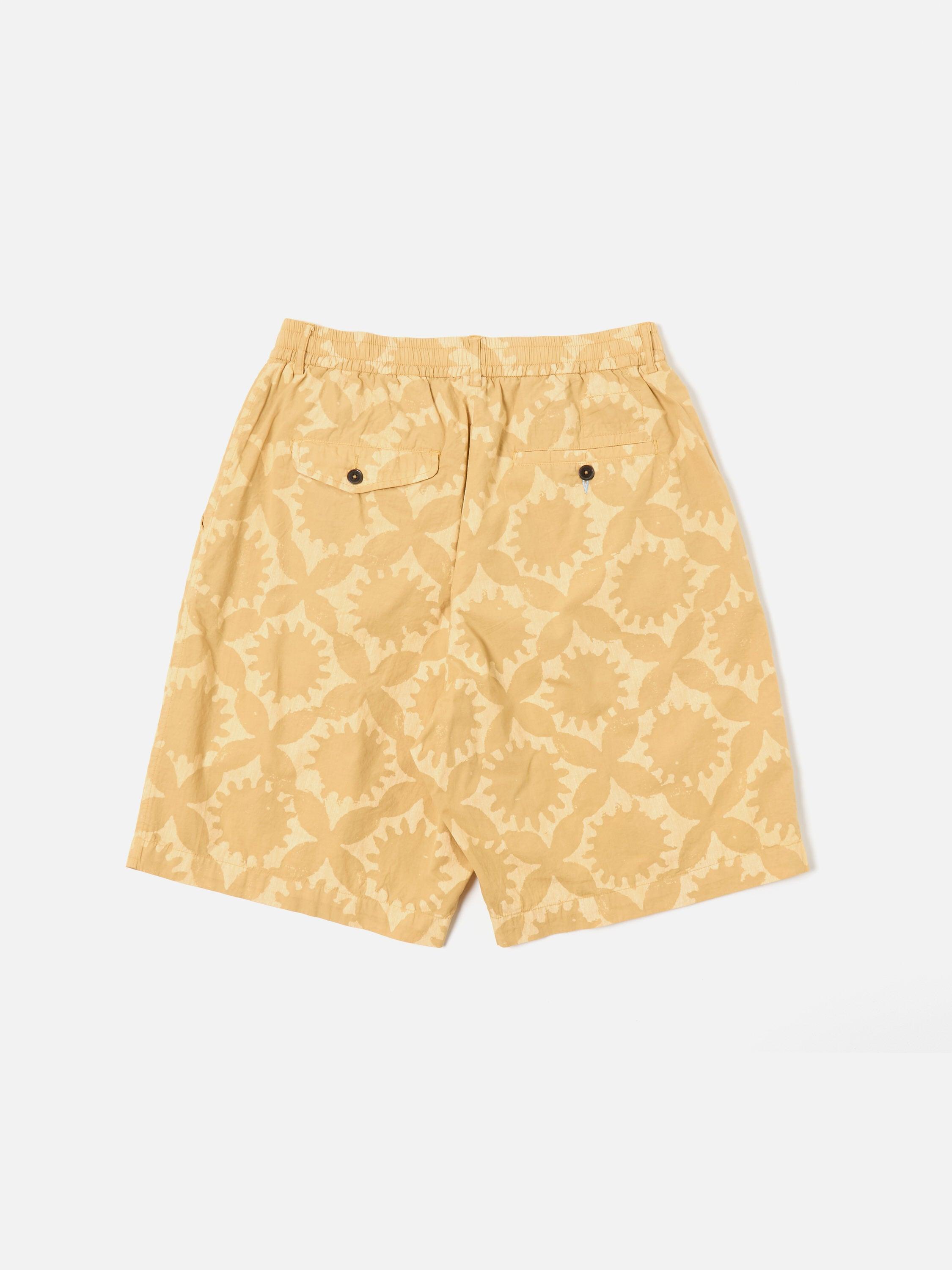 Universal Works Pleated Track Short in Sand Over Dyed Sun Print Product Image