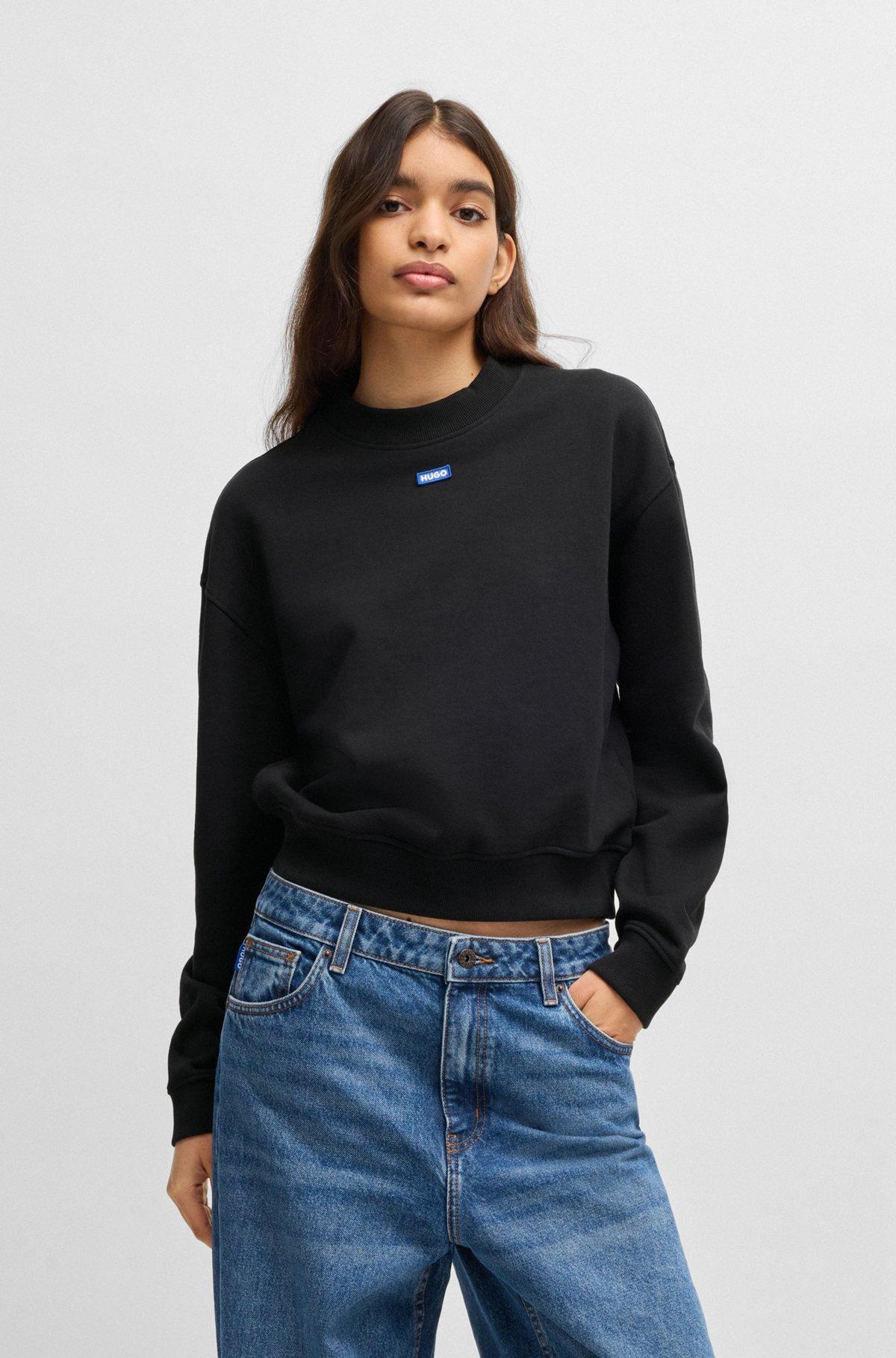 HUGO - Cotton-terry sweatshirt with logo badge - Black product image