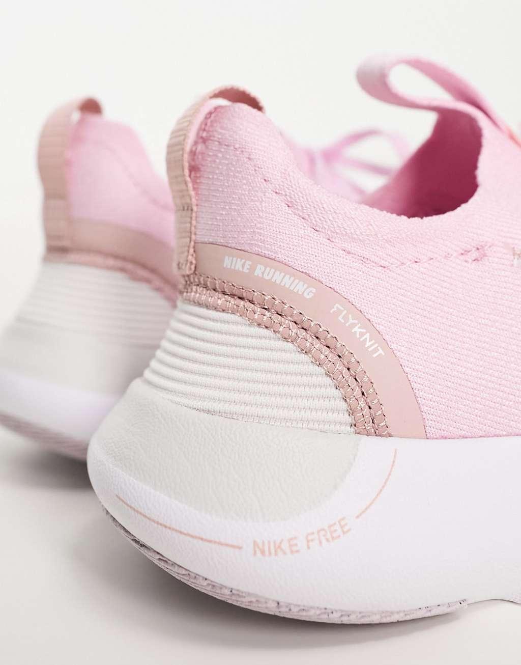 Nike Free Run Flyknit sneakers in pink Product Image