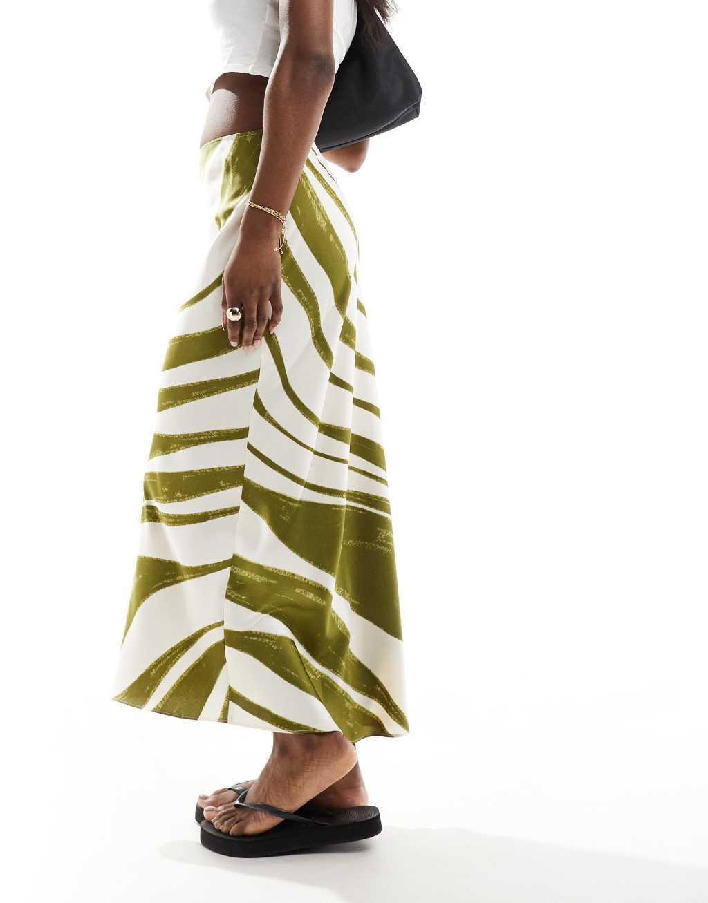 ASOS DESIGN satin bias midi skirt in green stripe Product Image