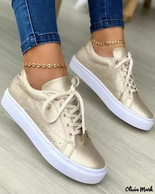 Olivia Mark – Lace-up eyelet sneakers with floral pattern Product Image