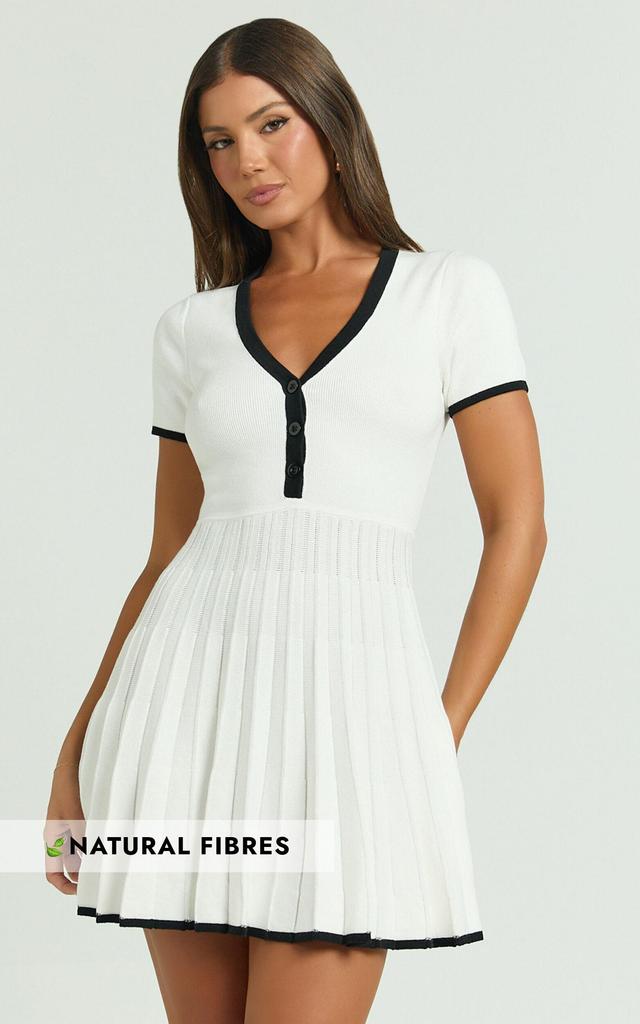 Vivienne Mini Dress - Short Sleeve Pleated Skirt Knitted Dress in Cream Product Image